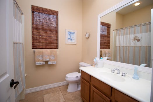 Bright and clean bathroom with a ceramic sink and stylish decor.